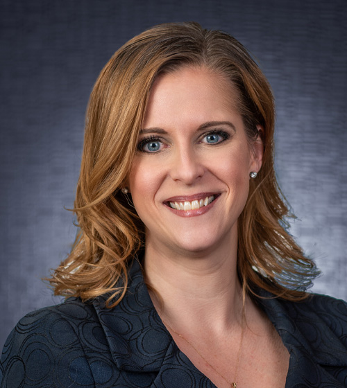 headshot image of Lisa Siefert, author of Title IX article
